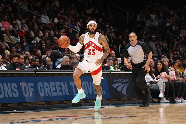 WASHINGTON, DC -? DECEMBER 27: Gary Trent Jr. #33 of the Toronto Raptors dribbles the ball during the game against the Washington Wizards on December 27, 2023 at Capital One Arena in Washington, DC. NOTE TO USER: User expressly acknowledges and agrees that, by downloading and or using this Photograph, user is consenting to the terms and conditions of the Getty Images License Agreement. Mandatory Copyright Notice: Copyright 2023 NBAE (Photo by Stephen Gosling/NBAE via Getty Images)