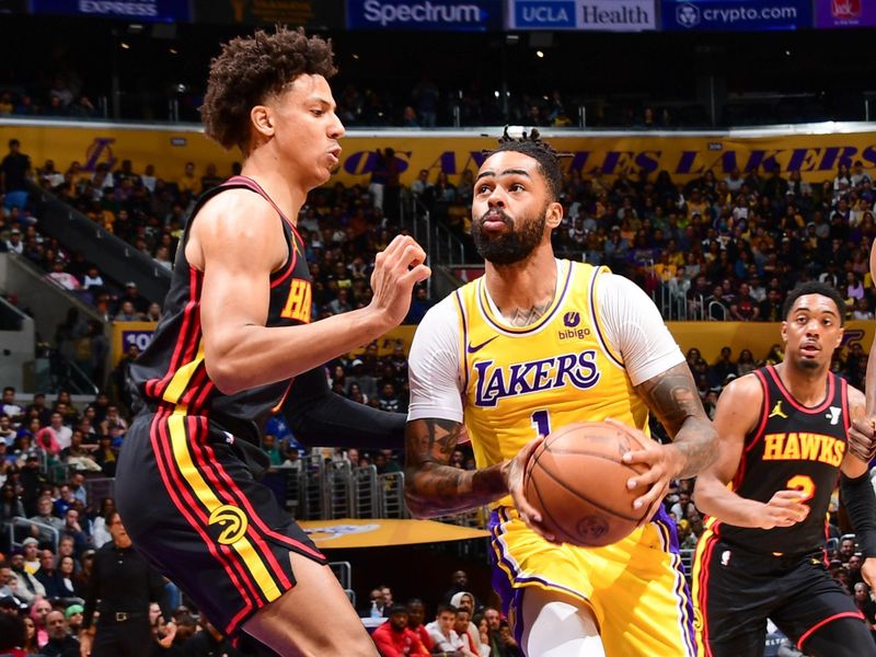 LOS ANGELES, CA - MARCH 18: D'Angelo Russell #1 of the Los Angeles Lakers goes to the basket during the game on March 18, 2024 at Crypto.Com Arena in Los Angeles, California. NOTE TO USER: User expressly acknowledges and agrees that, by downloading and/or using this Photograph, user is consenting to the terms and conditions of the Getty Images License Agreement. Mandatory Copyright Notice: Copyright 2024 NBAE (Photo by Adam Pantozzi/NBAE via Getty Images)