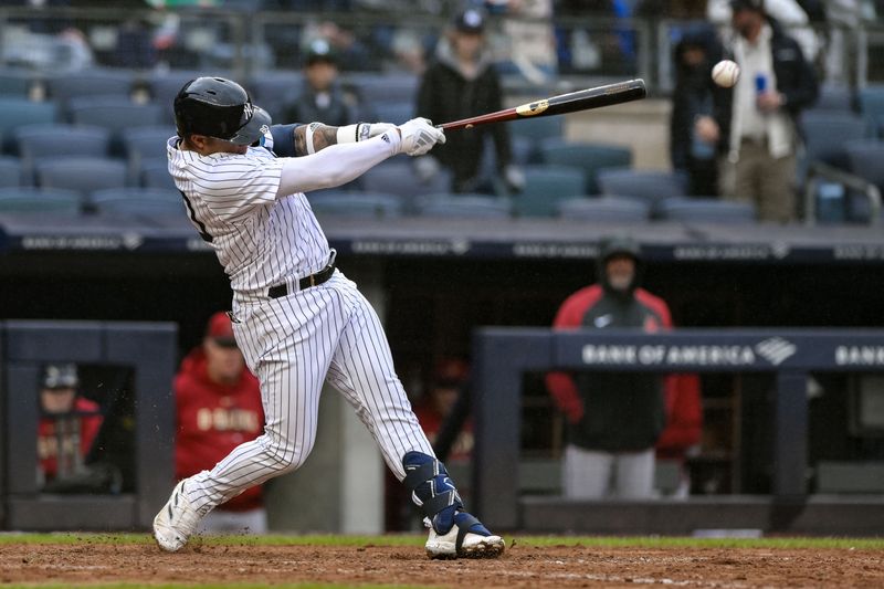 Sep 25, 2023; Bronx, New York, USA; New York Yankees center fielder Everson Pereira (80) hits a double against the Arizona Diamondbacks during the fifth inning at Yankee Stadium. Mandatory Credit: John Jones-USA TODAY Sports