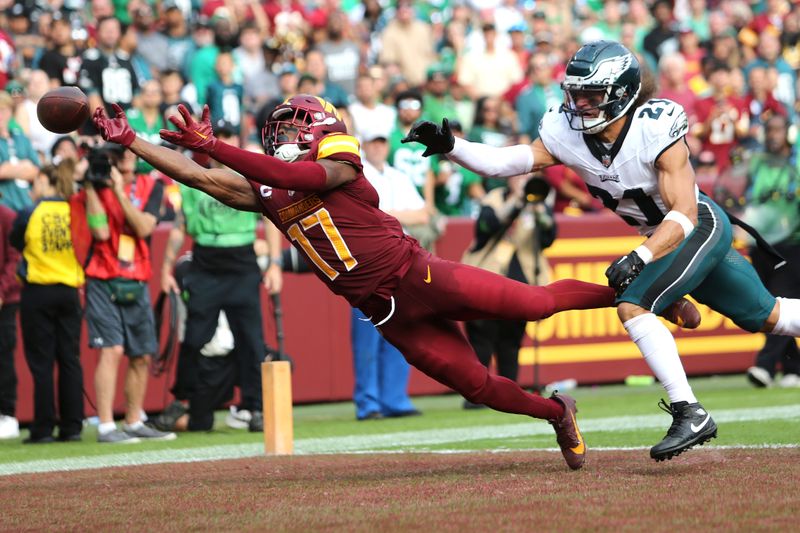 Washington Commanders wide receiver Terry McLaurin (17) stretches out to attempt to make a catch during an NFL football game against the Philadelphia Eagles, Sunday, October 29, 2023 in Landover, Maryland. (AP Photo/Daniel Kucin Jr.)