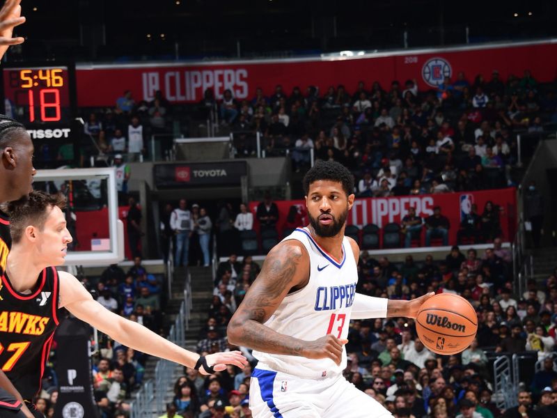 LOS ANGELES, CA - MARCH 17: Paul George #13 of the LA Clippers dribbles the ball during the game against the Atlanta Hawks on March 17, 2024 at Crypto.Com Arena in Los Angeles, California. NOTE TO USER: User expressly acknowledges and agrees that, by downloading and/or using this Photograph, user is consenting to the terms and conditions of the Getty Images License Agreement. Mandatory Copyright Notice: Copyright 2024 NBAE (Photo by Adam Pantozzi/NBAE via Getty Images)