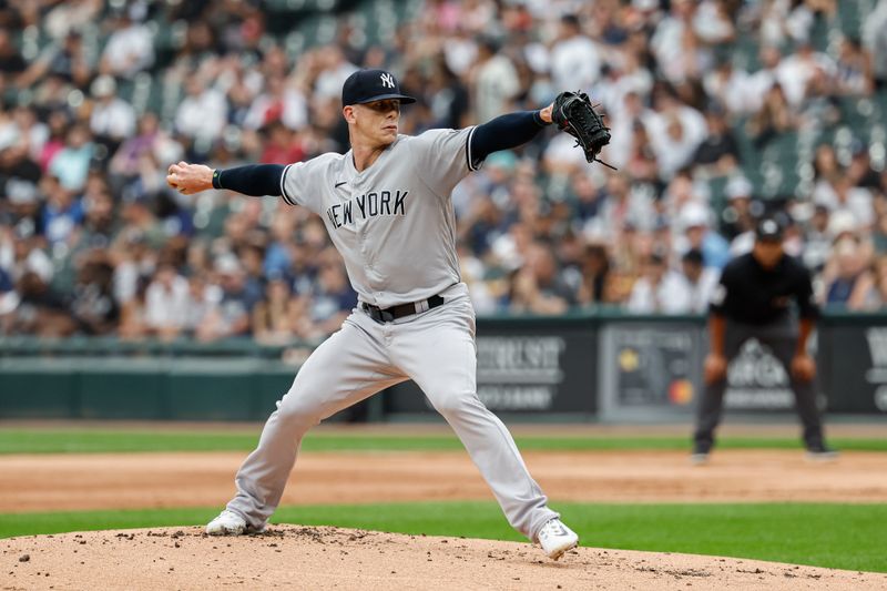 Aug 9, 2023; Chicago, Illinois, USA; New York Yankees starting pitcher Ian Hamilton (71) delivers a pitch against the Chicago White Sox during the first inning at Guaranteed Rate Field. Mandatory Credit: Kamil Krzaczynski-USA TODAY Sports