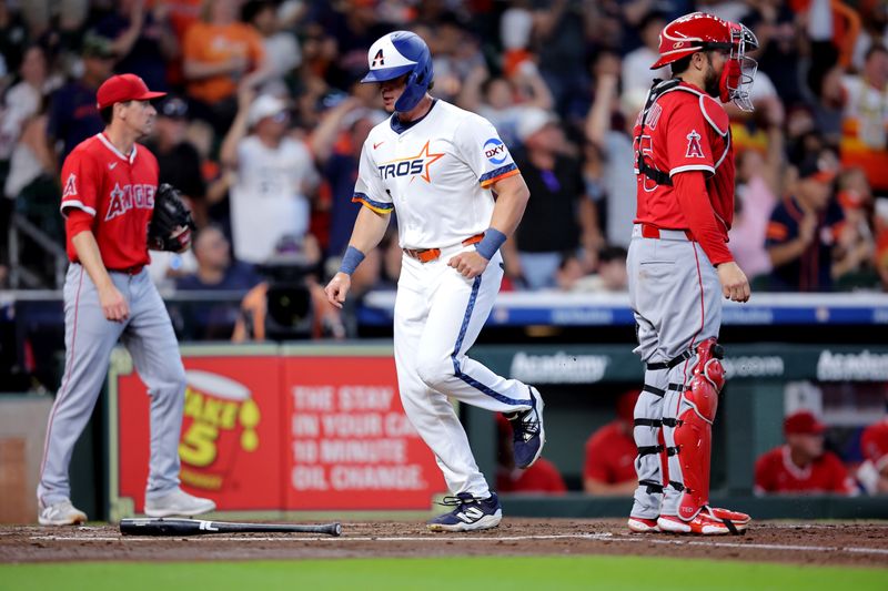 Apr 13, 2025; Houston, Texas, USA; Houston Astros center fielder Jake Meyers (6) crosses home plate to score a run against the Los Angeles Angels during the second inning at Daikin Park. Mandatory Credit: Erik Williams-Imagn Images