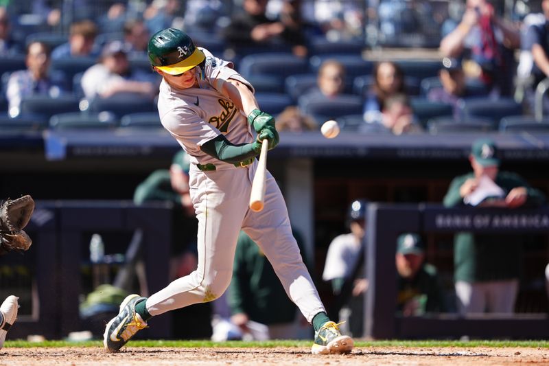 Apr 22, 2024; Bronx, New York, USA; Oakland Athletics second baseman Zack Gelof (20) hits a two run home run against the New York Yankees during the ninth inning at Yankee Stadium. Mandatory Credit: Gregory Fisher-USA TODAY Sports