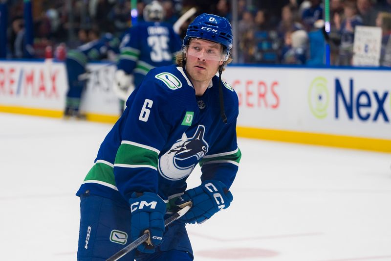 Dec 28, 2023; Vancouver, British Columbia, CAN; Vancouver Canucks forward Brock Boeser (6) shoots during warm up prior to a game against the Philadelphia Flyers at Rogers Arena. Mandatory Credit: Bob Frid-USA TODAY Sports