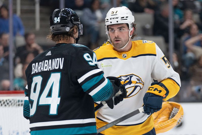 Feb 24, 2024; San Jose, California, USA; Nashville Predators defenseman Dante Fabbro (57) stares at San Jose Sharks left wing Alexander Barabanov (94) during the second period at SAP Center at San Jose. Mandatory Credit: Stan Szeto-USA TODAY Sports