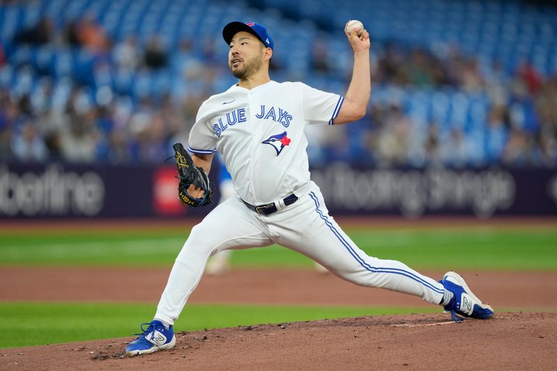 Sep 8, 2023; Toronto, Ontario, CAN; Toronto Blue Jays starting pitcher Yusei Kikuchi (16) pitches to the Kansas City Royals during the first inning at Rogers Centre. Mandatory Credit: John E. Sokolowski-USA TODAY Sports