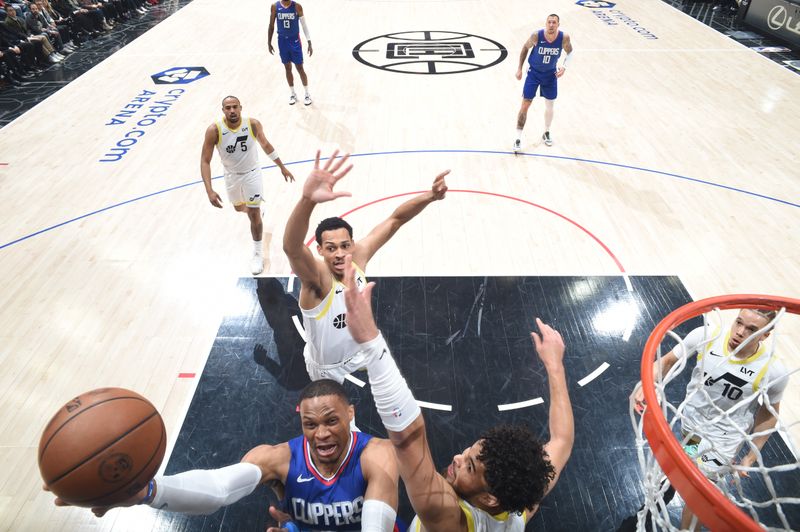 LOS ANGELES, CA - APRIL 5:  Russell Westbrook #0 of the LA Clippers goes to the basket during the game on April 5, 2024 at Crypto.Com Arena in Los Angeles, California. NOTE TO USER: User expressly acknowledges and agrees that, by downloading and/or using this Photograph, user is consenting to the terms and conditions of the Getty Images License Agreement. Mandatory Copyright Notice: Copyright 2024 NBAE (Photo by Adam Pantozzi/NBAE via Getty Images)