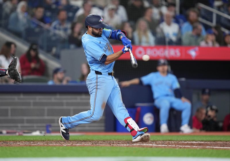 May 11, 2024; Toronto, Ontario, CAN; Toronto Blue Jays second baseman Isiah Kiner-Falefa (7) hits a single against the Minnesota Twins during the seventh  inning at Rogers Centre. Mandatory Credit: Nick Turchiaro-USA TODAY Sports