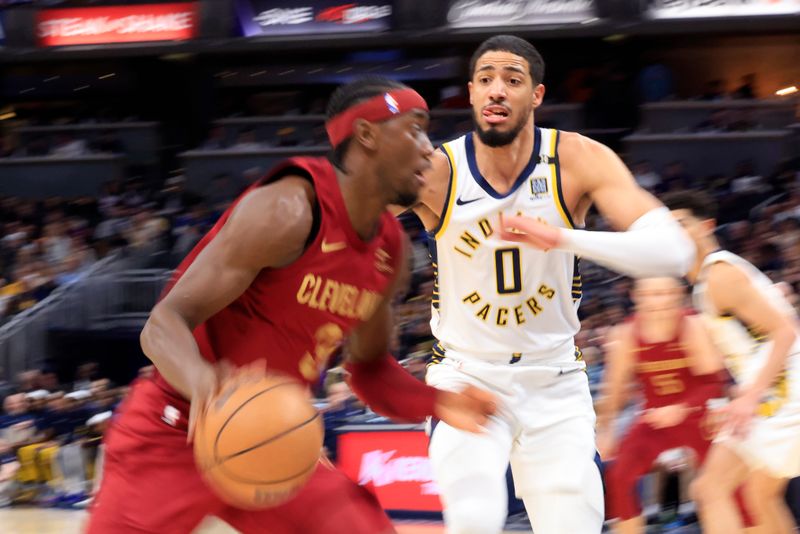 INDIANAPOLIS, INDIANA - MARCH 18: Caris LeVert #3 of the Cleveland Cavaliers drives to the basket against Tyrese Haliburton #0 of the Indiana Pacers during the first half at Gainbridge Fieldhouse on March 18, 2024 in Indianapolis, Indiana. NOTE TO USER: User expressly acknowledges and agrees that, by downloading and or using this photograph, User is consenting to the terms and conditions of the Getty Images License Agreement. (Photo by Justin Casterline/Getty Images)