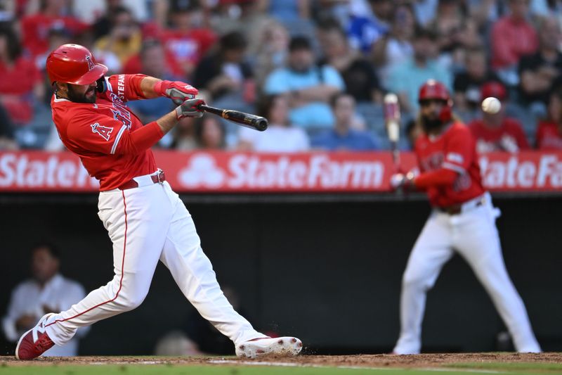 Aug 17, 2024; Anaheim, California, USA; Los Angeles Angels designated hitter Michael Stefanic (38) singles against the Atlanta Braves during the second inning at Angel Stadium. Mandatory Credit: Jonathan Hui-USA TODAY Sports