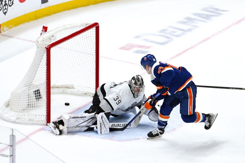 Dec 9, 2023; Elmont, New York, USA; New York Islanders center Jean-Gabriel Pageau (44) scores the game winning goal in overtime against Los Angeles Kings goaltender Cam Talbot (39) at UBS Arena. Mandatory Credit: John Jones-USA TODAY Sports