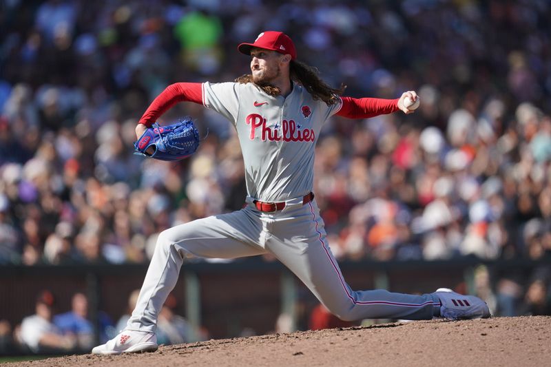 May 27, 2024; San Francisco, California, USA; Philadelphia Phillies pitcher Matt Strahm (25) delivers a pitch against the San Francisco Giants in the eighth inning at Oracle Park. Mandatory Credit: Cary Edmondson-USA TODAY Sports