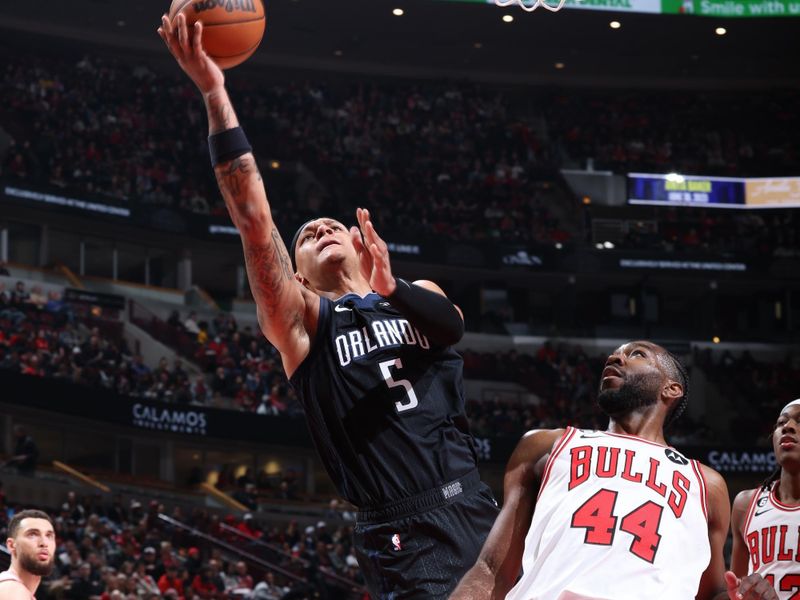 CHICAGO, IL - FERUARY 13: Paolo Banchero #5 of the Orlando Magic shoots the ball during the game against the Chicago Bulls on February 13, 2023 at United Center in Chicago, Illinois. NOTE TO USER: User expressly acknowledges and agrees that, by downloading and or using this photograph, User is consenting to the terms and conditions of the Getty Images License Agreement. Mandatory Copyright Notice: Copyright 2023 NBAE (Photo by Jeff Haynes/NBAE via Getty Images)