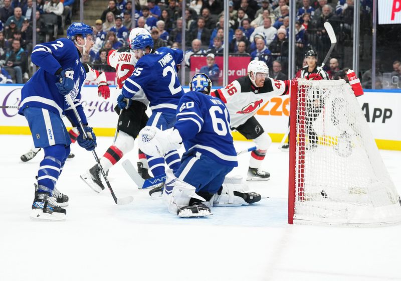 Mar 26, 2024; Toronto, Ontario, CAN; New Jersey Devils center Max Willman (46) scores a goal against the Toronto Maple Leafs during the second period at Scotiabank Arena. Mandatory Credit: Nick Turchiaro-USA TODAY Sports