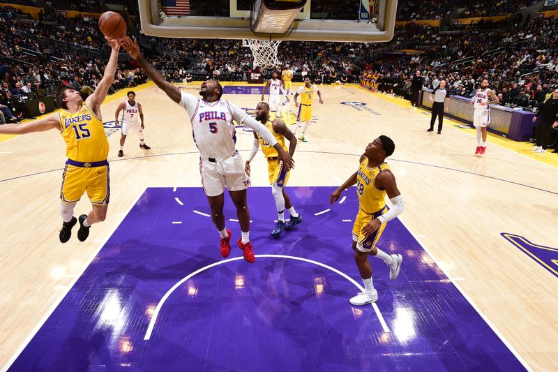 LOS ANGELES, CA - NOVEMBER 8: Andre Drummond #5 of the Philadelphia 76ers goes up for the rebound during the game against the Los Angeles Lakers on Novemberr 8, 2024 at Crypto.Com Arena in Los Angeles, California. NOTE TO USER: User expressly acknowledges and agrees that, by downloading and/or using this Photograph, user is consenting to the terms and conditions of the Getty Images License Agreement. Mandatory Copyright Notice: Copyright 2024 NBAE (Photo by Adam Pantozzi/NBAE via Getty Images)