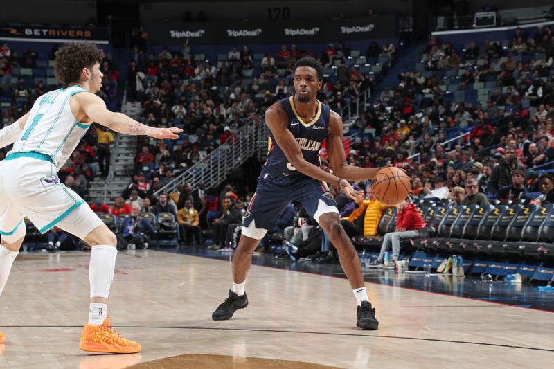 NEW ORLEANS, LA - JANUARY 17: Herb Jones #5 of the New Orleans Pelicans handles the ball during the game against the Charlotte Hornets on January 17, 2024 at the Smoothie King Center in New Orleans, Louisiana. NOTE TO USER: User expressly acknowledges and agrees that, by downloading and or using this Photograph, user is consenting to the terms and conditions of the Getty Images License Agreement. Mandatory Copyright Notice: Copyright 2024 NBAE (Photo by Layne Murdoch Jr./NBAE via Getty Images)