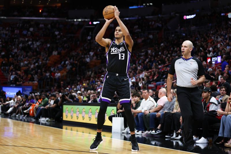 MIAMI, FLORIDA - JANUARY 31: Keegan Murray #13 of the Sacramento Kings shoots the ball against the Miami Heat during the second quarter of the game at Kaseya Center on January 31, 2024 in Miami, Florida. NOTE TO USER: User expressly acknowledges and agrees that, by downloading and or using this photograph, User is consenting to the terms and conditions of the Getty Images License Agreement. (Photo by Megan Briggs/Getty Images)