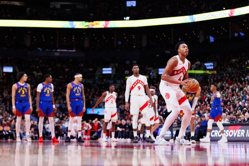 TORONTO, CANADA - OCTOBER 28: Scottie Barnes #4 of the Toronto Raptors takes a free throw during the second half of their NBA game against the Denver Nuggets at Scotiabank Arena on October 28, 2024 in Toronto, Ontario, Canada. NOTE TO USER: User expressly acknowledges and agrees that, by downloading and or using this photograph, User is consenting to the terms and conditions of the Getty Images License Agreement. (Photo by Cole Burston/Getty Images)