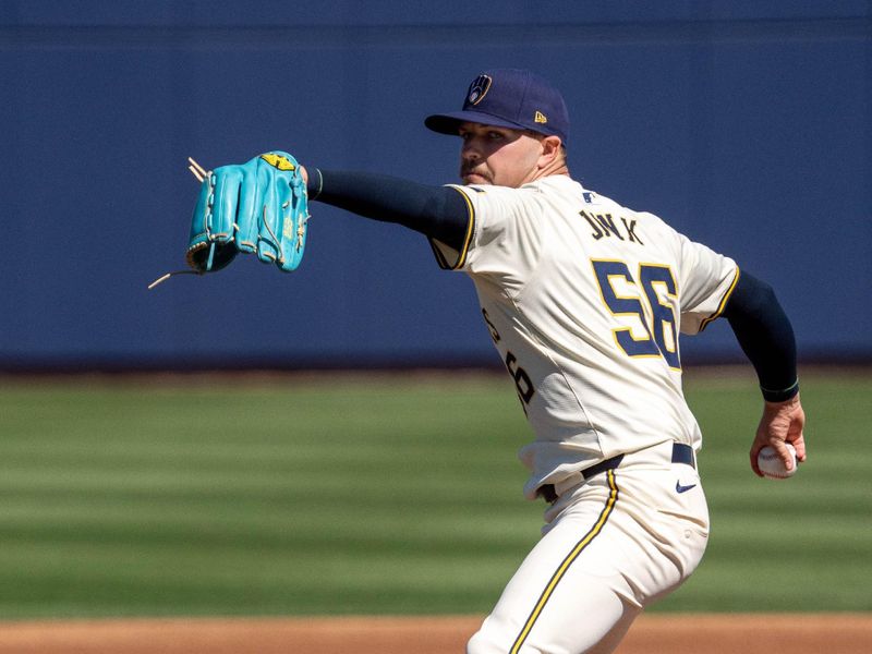 Mar 2, 2024; Phoenix, Arizona, USA; Milwaukee Brewers starting pitcher Janson Junk (56) warms up in the first during a spring training game against the Los Angeles Dodgers at American Family Fields of Phoenix. Mandatory Credit: Allan Henry-USA TODAY Sports