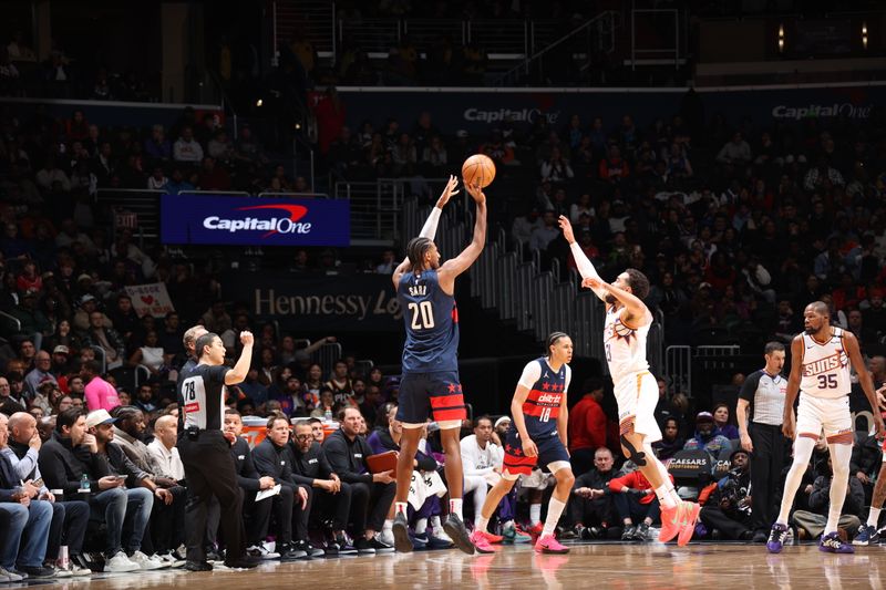 WASHINGTON, DC -?JANUARY 16 : Alexandre Sarr #20 of the Washington Wizards shoots the ball during the game against the Phoenix Suns on January 16, 2025 at Capital One Arena in Washington, DC. NOTE TO USER: User expressly acknowledges and agrees that, by downloading and or using this Photograph, user is consenting to the terms and conditions of the Getty Images License Agreement. Mandatory Copyright Notice: Copyright 2024 NBAE (Photo by Stephen Gosling/NBAE via Getty Images)