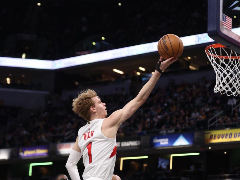 INDIANAPOLIS, IN - FEBRUARY 27: Gradey Dick #1 of the Toronto Raptors drives to the basket during the game against the Indiana Pacers on February 27, 2024 at Gainbridge Fieldhouse in Indianapolis, Indiana. NOTE TO USER: User expressly acknowledges and agrees that, by downloading and or using this Photograph, user is consenting to the terms and conditions of the Getty Images License Agreement. Mandatory Copyright Notice: Copyright 2024 NBAE (Photo by Pepper Robinson/NBAE via Getty Images)