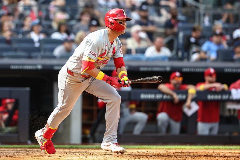 Sep 1, 2024; Bronx, New York, USA;  St. Louis Cardinals left fielder Lars Nootbaar (21) hits a three run double in the seventh inning against the New York Yankees at Yankee Stadium. Mandatory Credit: Wendell Cruz-USA TODAY Sports