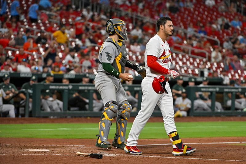 Aug 16, 2023; St. Louis, Missouri, USA;  St. Louis Cardinals third baseman Nolan Arenado (28) tosses his helmet after striking out against the Oakland Athletics to end the eighth inning at Busch Stadium. Mandatory Credit: Jeff Curry-USA TODAY Sports