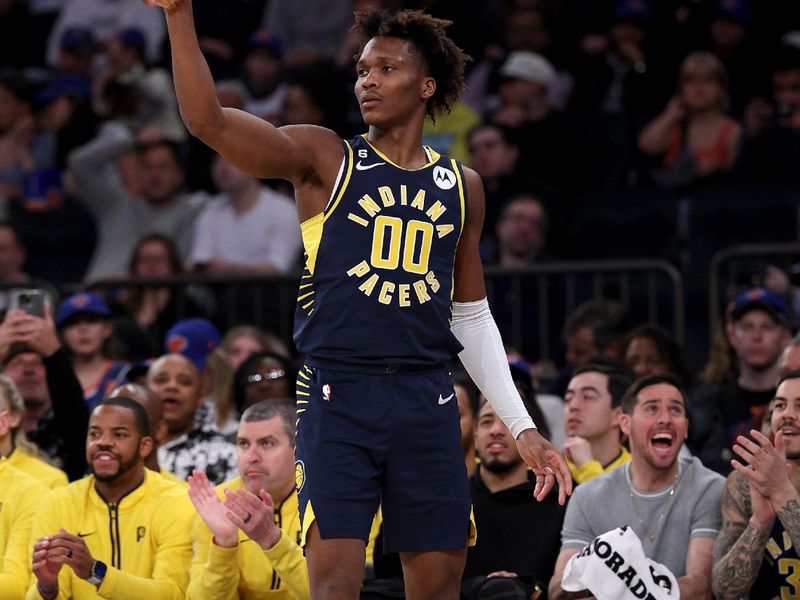 NEW YORK, NEW YORK - APRIL 09:  Bennedict Mathurin #00 of the Indiana Pacers celebrates his three point shot in the first half against the New York Knicks at Madison Square Garden on April 09, 2023 in New York City. NOTE TO USER: User expressly acknowledges and agrees that, by downloading and or using this photograph, User is consenting to the terms and conditions of the Getty Images License Agreement. (Photo by Elsa/Getty Images)