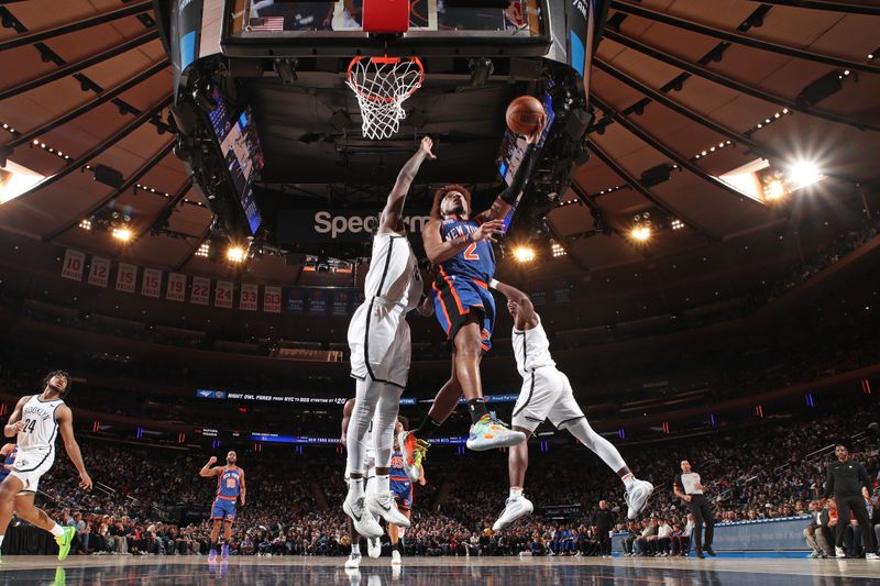 NEW YORK, NY - MARCH 23: Miles McBride #2 of the New York Knicks drives to the basket during the game against the Brooklyn Nets on March 23, 2024 at Madison Square Garden in New York City, New York.  NOTE TO USER: User expressly acknowledges and agrees that, by downloading and or using this photograph, User is consenting to the terms and conditions of the Getty Images License Agreement. Mandatory Copyright Notice: Copyright 2024 NBAE  (Photo by Nathaniel S. Butler/NBAE via Getty Images)