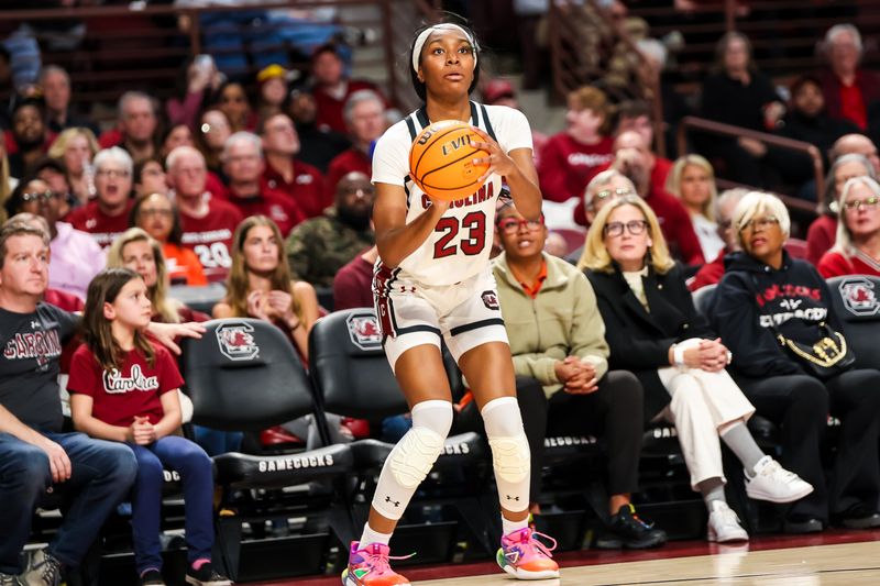 Jan 15, 2024; Columbia, South Carolina, USA; South Carolina Gamecocks guard Bree Hall (23) attempts a three point basket against the Kentucky Wildcats in the first half at Colonial Life Arena. Mandatory Credit: Jeff Blake-USA TODAY Sports