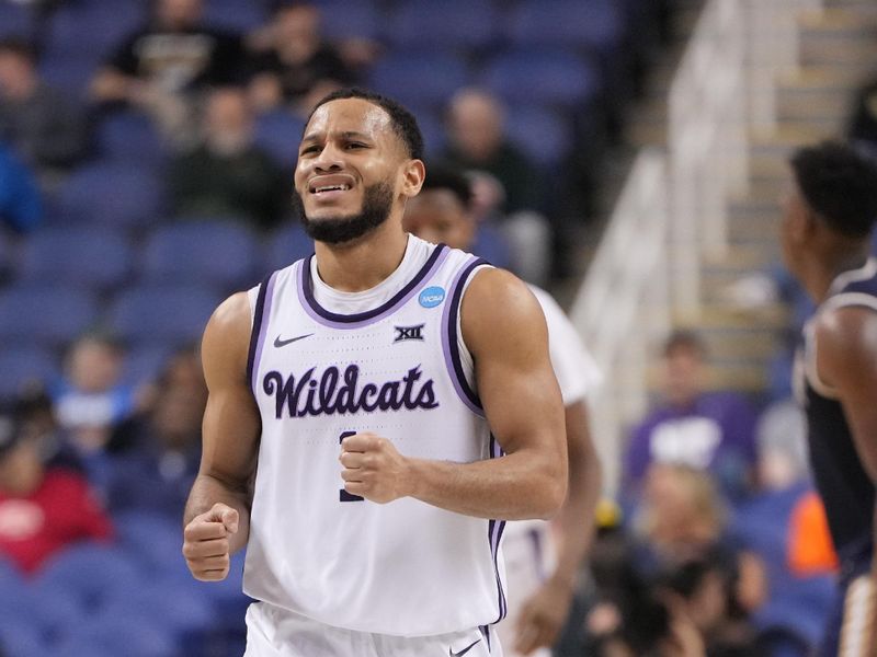 Mar 17, 2023; Greensboro, NC, USA; Kansas State Wildcats guard Markquis Nowell (1) reacts in the second half against the Montana State Bobcats at Greensboro Coliseum. Mandatory Credit: Bob Donnan-USA TODAY Sports