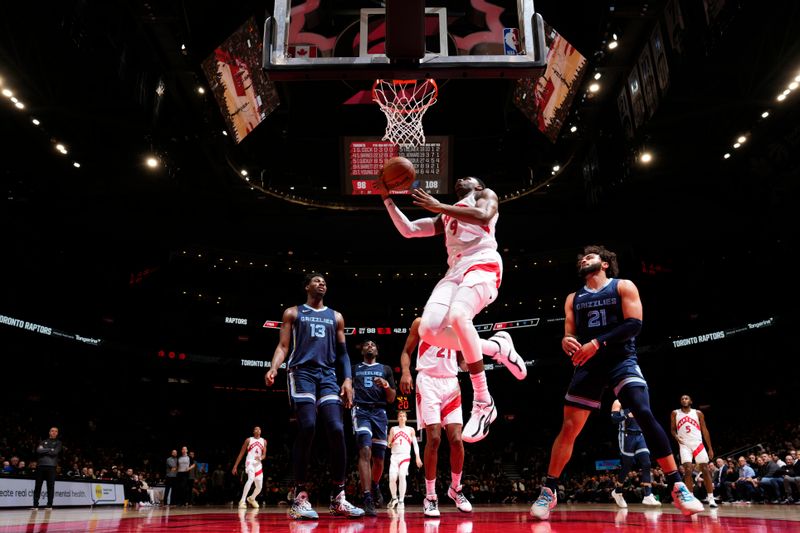 TORONTO, CANADA - JANUARY 22: RJ Barrett #9 of the Toronto Raptors drives to the basket during the game against the Memphis Grizzlies on January 22, 2024 at the Scotiabank Arena in Toronto, Ontario, Canada.  NOTE TO USER: User expressly acknowledges and agrees that, by downloading and or using this Photograph, user is consenting to the terms and conditions of the Getty Images License Agreement.  Mandatory Copyright Notice: Copyright 2024 NBAE (Photo by Mark Blinch/NBAE via Getty Images)