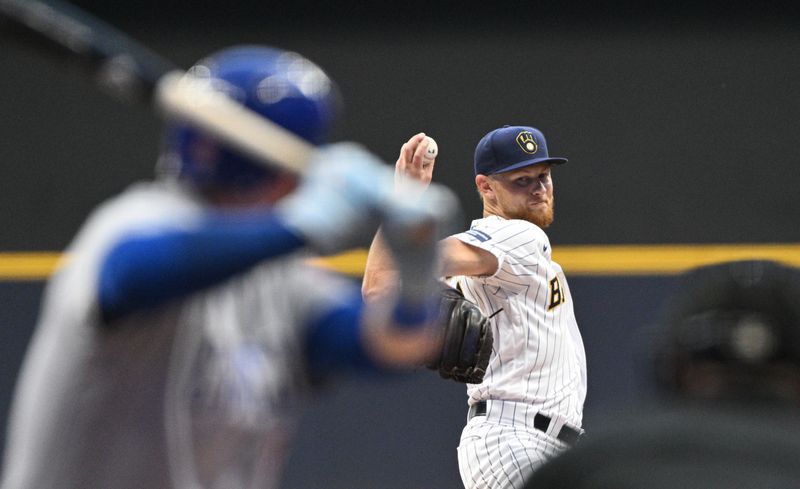 Sep 30, 2023; Milwaukee, Wisconsin, USA; Milwaukee Brewers starting pitcher Eric Lauer (52) delivers a pitch against the Chicago Cubs in the first inning at American Family Field. Mandatory Credit: Michael McLoone-USA TODAY Sports