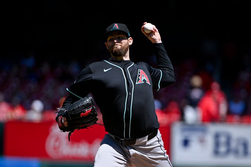 Apr 24, 2024; St. Louis, Missouri, USA;  Arizona Diamondbacks starting pitcher Jordan Montgomery (52) pitches against the St. Louis Cardinals during the first inning at Busch Stadium. Mandatory Credit: Jeff Curry-USA TODAY Sports