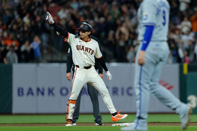 May 19, 2025; San Francisco, California, USA; San Francisco Giants center fielder Jung Hoo Lee (51) celebrates after hitting an rbi double during the eighth inning against the Kansas City Royals at Oracle Park. Mandatory Credit: Sergio Estrada-Imagn Images