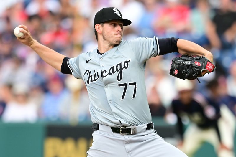 Jul 2, 2024; Cleveland, Ohio, USA; Chicago White Sox starting pitcher Chris Flexen (77) throws a pitch during the first inning against the Cleveland Guardians at Progressive Field. Mandatory Credit: Ken Blaze-USA TODAY Sports