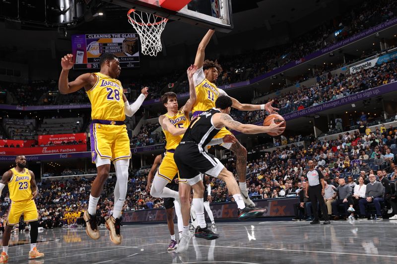 MEMPHIS, TN - MARCH 27: Shaquille Harrison #1 of the Memphis Grizzlies passes the ball during the game against the Los Angeles Lakers on March 27, 2024 at FedExForum in Memphis, Tennessee. NOTE TO USER: User expressly acknowledges and agrees that, by downloading and or using this photograph, User is consenting to the terms and conditions of the Getty Images License Agreement. Mandatory Copyright Notice: Copyright 2024 NBAE (Photo by Joe Murphy/NBAE via Getty Images)