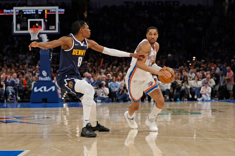 OKLAHOMA CITY, OK - MARCH 10: Aaron Wiggins #21 of the Oklahoma City Thunder dribbles the ball during the game against the Denver Nuggets on March 10, 2025 at Paycom Center in Oklahoma City, Oklahoma. NOTE TO USER: User expressly acknowledges and agrees that, by downloading and or using this photograph, User is consenting to the terms and conditions of the Getty Images License Agreement. Mandatory Copyright Notice: Copyright 2025 NBAE (Photo by Martin McGrew/NBAE via Getty Images)