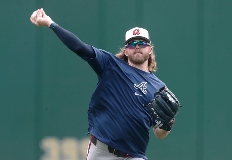 May 26, 2024; Pittsburgh, Pennsylvania, USA;  Atlanta Braves relief pitcher Pierce Johnson (38) throws in the outfield before the game against the Pittsburgh Pirates at PNC Park. Mandatory Credit: Charles LeClaire-USA TODAY Sports