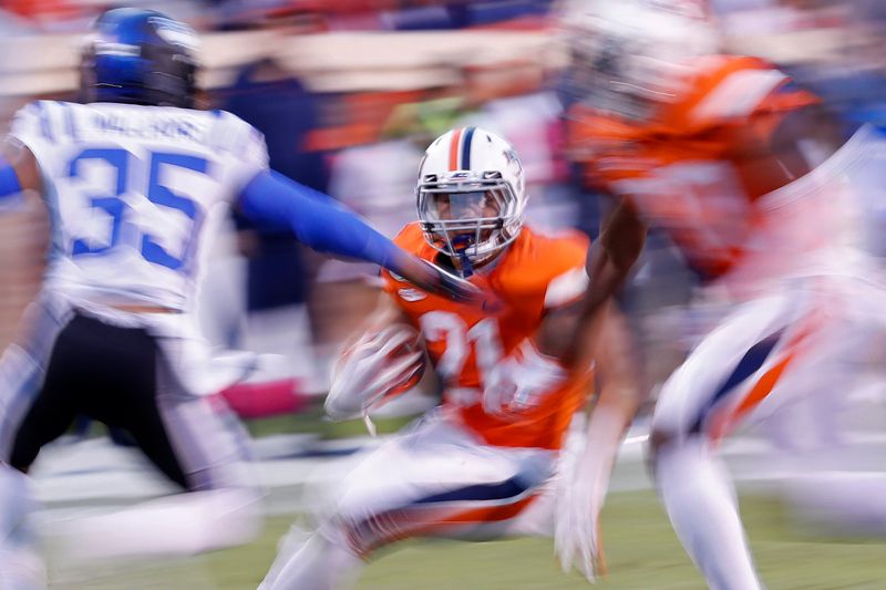 Oct 19, 2019; Charlottesville, VA, USA; Virginia Cavaliers running back Wayne Taulapapa (21) carries the ball as Duke Blue Devils safety Antone Williams (35) chases in the fourth quarter at Scott Stadium. Mandatory Credit: Geoff Burke-USA TODAY Sports