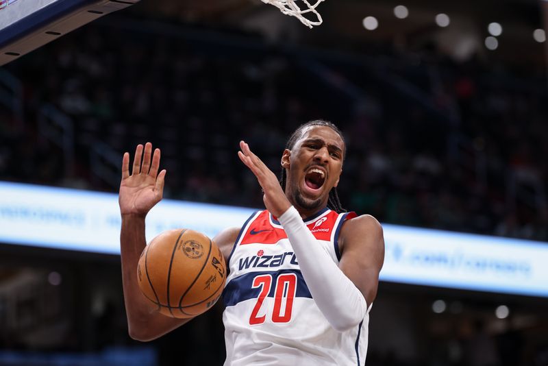 WASHINGTON, DC - OCTOBER 24: Alex Sarr #20 of the Washington Wizards dunks the ball against the Boston Celtics during the first half at Capital One Arena on October 24, 2024 in Washington, DC. NOTE TO USER: User expressly acknowledges and agrees that, by downloading and or using this photograph, User is consenting to the terms and conditions of the Getty Images License Agreement. (Photo by Scott Taetsch/Getty Images)