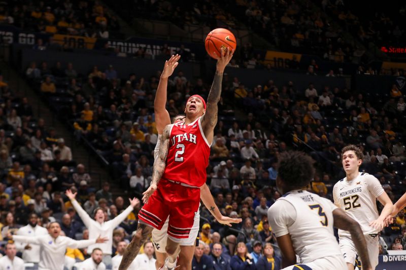 Feb 18, 2026; Morgantown, West Virginia, USA; Utah Utes guard Terrence Brown (2) shoots during the first half against the West Virginia Mountaineers at Hope Coliseum. Mandatory Credit: Ben Queen-Imagn Images