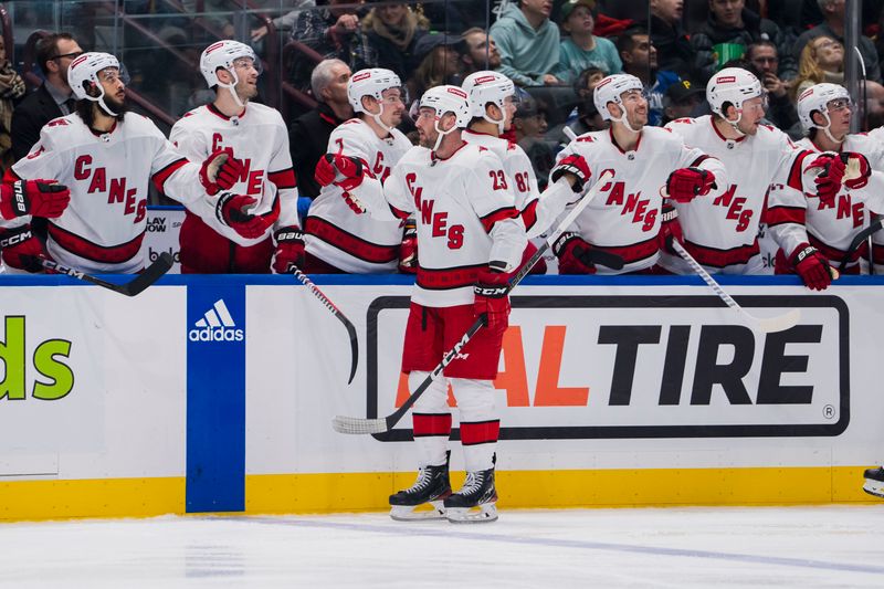 Dec 9, 2023; Vancouver, British Columbia, CAN; Carolina Hurricanes forward Stefan Noesen (23) celebrates his goal against the Vancouver Canucks in the third period at Rogers Arena. Vancouver won 4-3. Mandatory Credit: Bob Frid-USA TODAY Sports