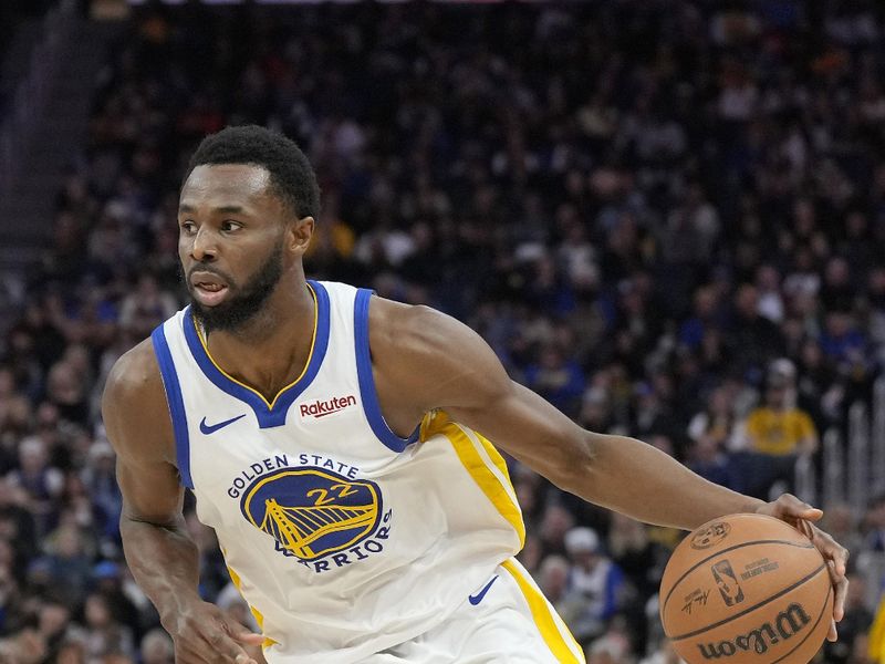 SAN FRANCISCO, CALIFORNIA - JANUARY 02: Andrew Wiggins #22 of the Golden State Warriors dribbling the ball looks to drive towards the basket against the Orlando Magic during the fourth quarter of an NBA basketball game at Chase Center on January 02, 2024 in San Francisco, California. NOTE TO USER: User expressly acknowledges and agrees that, by downloading and or using this photograph, User is consenting to the terms and conditions of the Getty Images License Agreement. (Photo by Thearon W. Henderson/Getty Images)