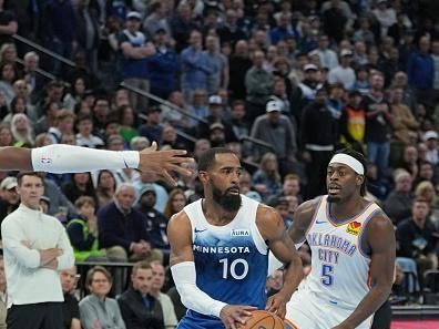 MINNEAPOLIS, MN -  NOVEMBER 28: Mike Conley #10 of the Minnesota Timberwolves dribbles the ball during the game against the Oklahoma City Thunder during the In-Season Tournament on November 28, 2023 at Target Center in Minneapolis, Minnesota. NOTE TO USER: User expressly acknowledges and agrees that, by downloading and or using this Photograph, user is consenting to the terms and conditions of the Getty Images License Agreement. Mandatory Copyright Notice: Copyright 2023 NBAE (Photo by Jordan Johnson/NBAE via Getty Images)