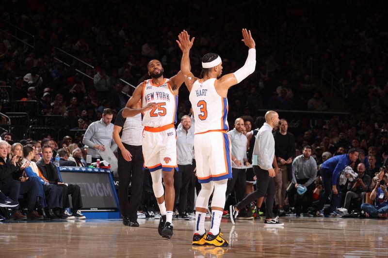 NEW YORK, NY - NOVEMBER 17: Mikal Bridges #25 and Josh Hart #3 of the New York Knicks high five during the game against the Brooklyn Nets on November 17, 2024 at Madison Square Garden in New York City, New York.  NOTE TO USER: User expressly acknowledges and agrees that, by downloading and or using this photograph, User is consenting to the terms and conditions of the Getty Images License Agreement. Mandatory Copyright Notice: Copyright 2024 NBAE  (Photo by Nathaniel S. Butler/NBAE via Getty Images)