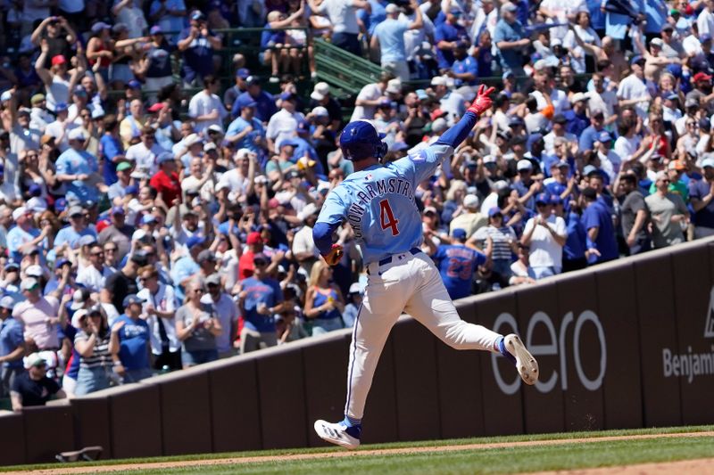 May 16, 2025; Chicago, Illinois, USA; Chicago Cubs outfielder Pete Crow-Armstrong (4) gestures after hitting a three run home run against the Chicago White Sox during the second inning at Wrigley Field. Mandatory Credit: David Banks-Imagn Images
