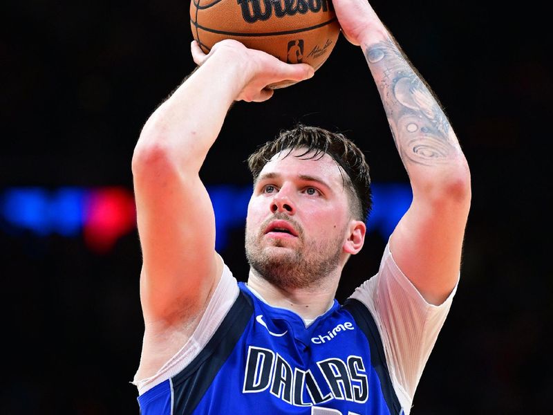 ATLANTA, GA - JANUARY 26: Luka Doncic #77 of the Dallas Mavericks shoots a free throw during the game against the Atlanta Hawks on January 26, 2024 at State Farm Arena in Atlanta, Georgia.  NOTE TO USER: User expressly acknowledges and agrees that, by downloading and/or using this Photograph, user is consenting to the terms and conditions of the Getty Images License Agreement. Mandatory Copyright Notice: Copyright 2024 NBAE (Photo by Adam Hagy/NBAE via Getty Images)