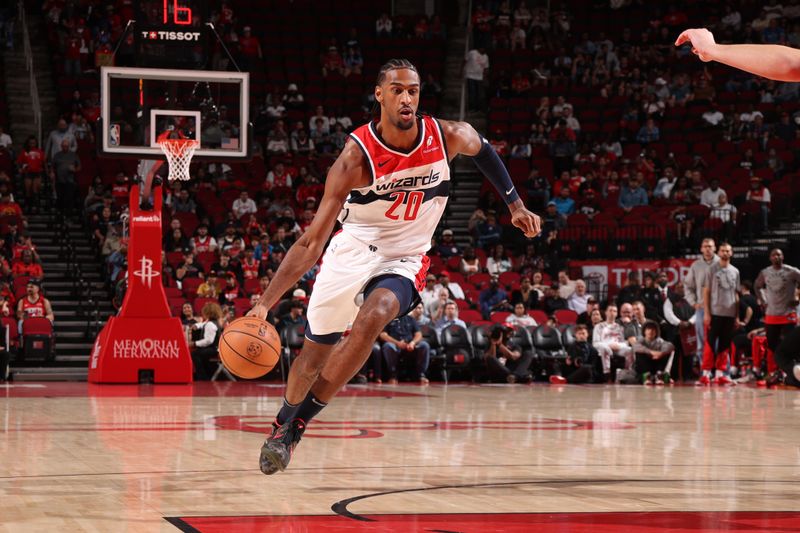 HOUSTON, TX - NOVEMBER 11: Alexandre Sarr #20 of the Washington Wizards dribbles the ball during the game against the Houston Rockets on November 11, 2024 at the Toyota Center in Houston, Texas. NOTE TO USER: User expressly acknowledges and agrees that, by downloading and or using this photograph, User is consenting to the terms and conditions of the Getty Images License Agreement. Mandatory Copyright Notice: Copyright 2024 NBAE (Photo by KeShawn Ennis/NBAE via Getty Images)